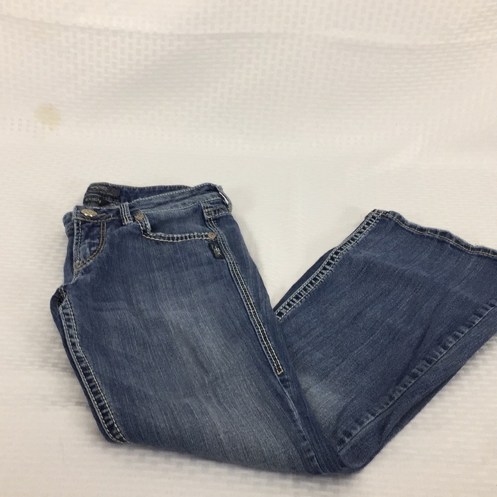 Women’s silver jeans size W 27L 31